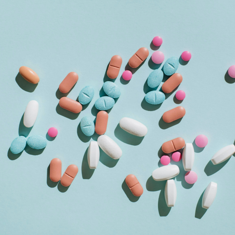 Assorted tablets on a blue background